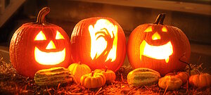 Three halloween jack-o’-lanterns.